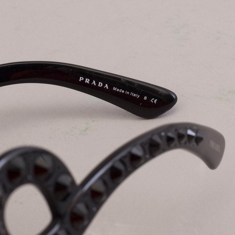 SUNGLASSES, Prada.