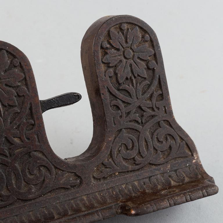 A 19th century iron umbrella and walkingstick holder.