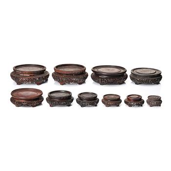 998. A group of 10 Chinese wooden stands, Qing dynasty (1644-1912).