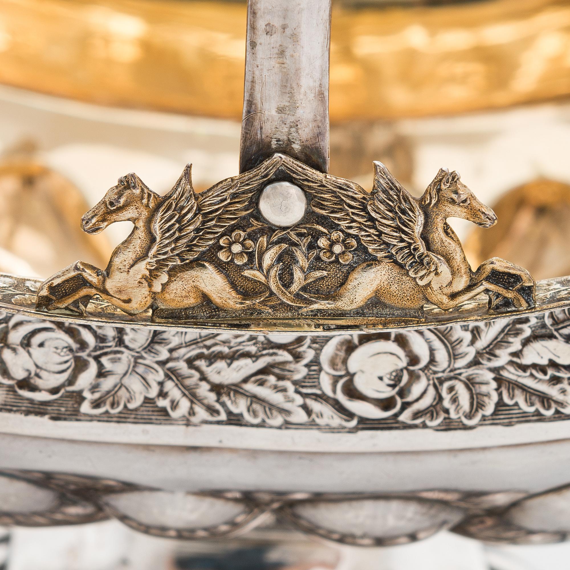 A parcel-gilt silver sweetmeat basket, maker's mark of Elias Modig (1795-1834), Saint Petersburg, Russia 1829.