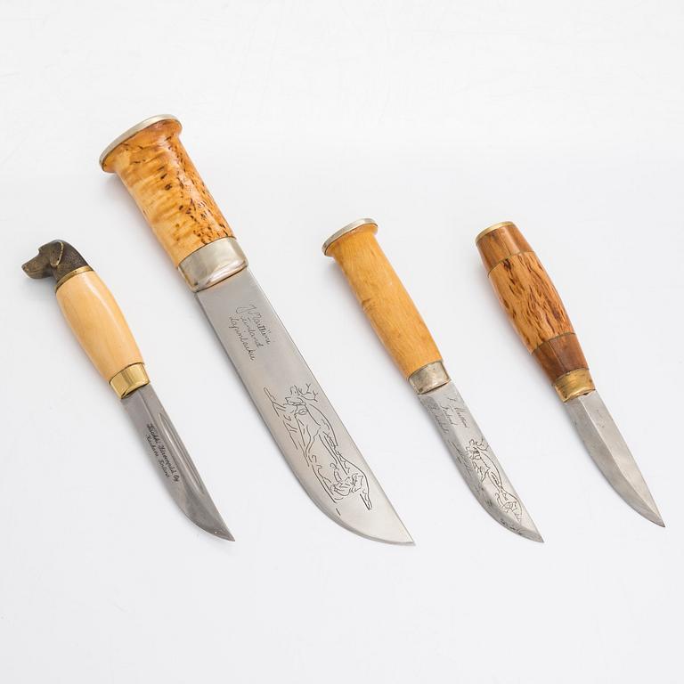 Four puukko knives from the latter half of the 20th century.