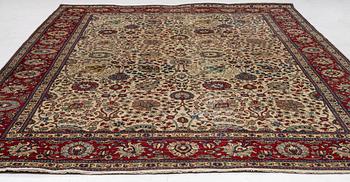 A Tabriz carpet, c. 385 x 287 cm.