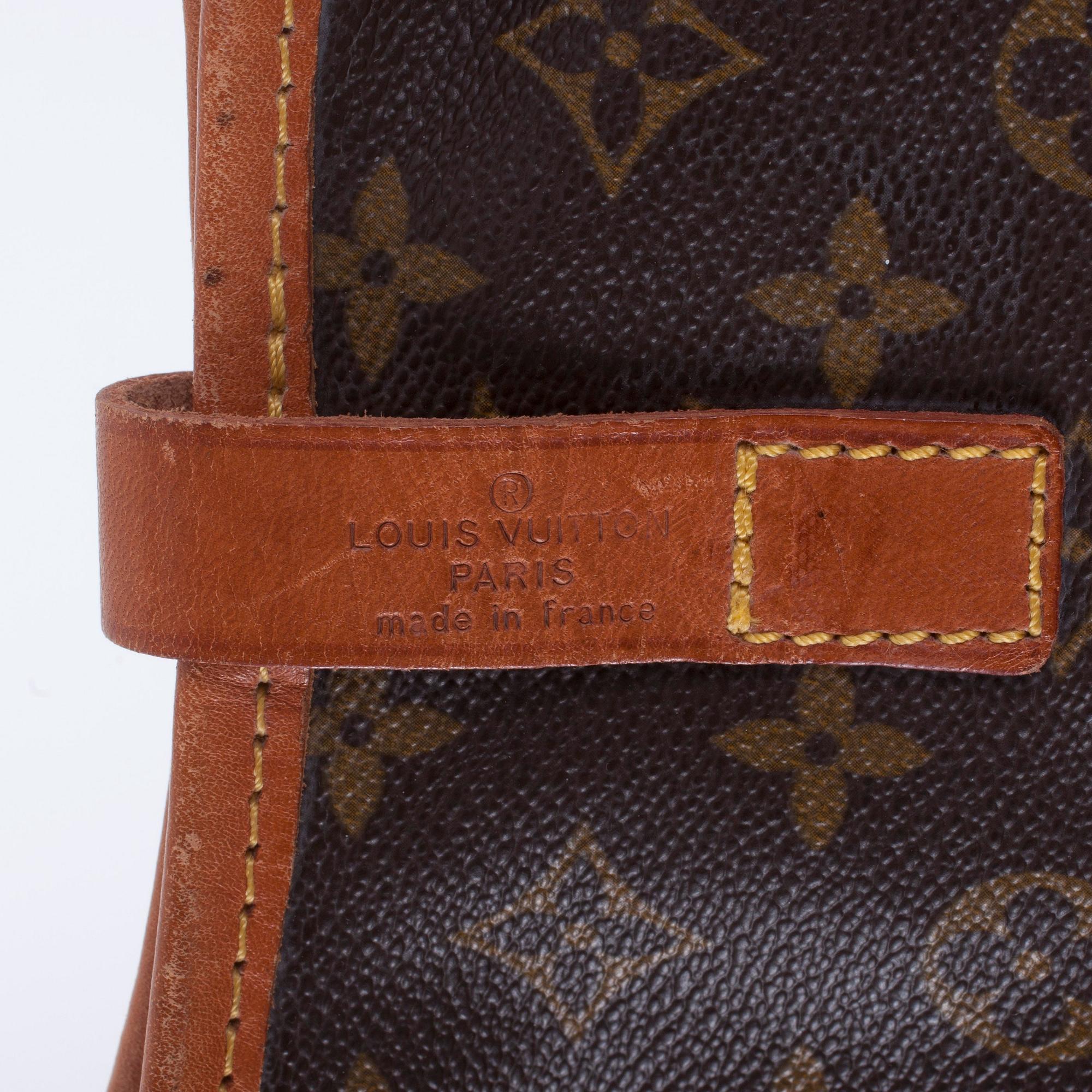 LOUIS VUITTON, a monogram canvas garment cover.