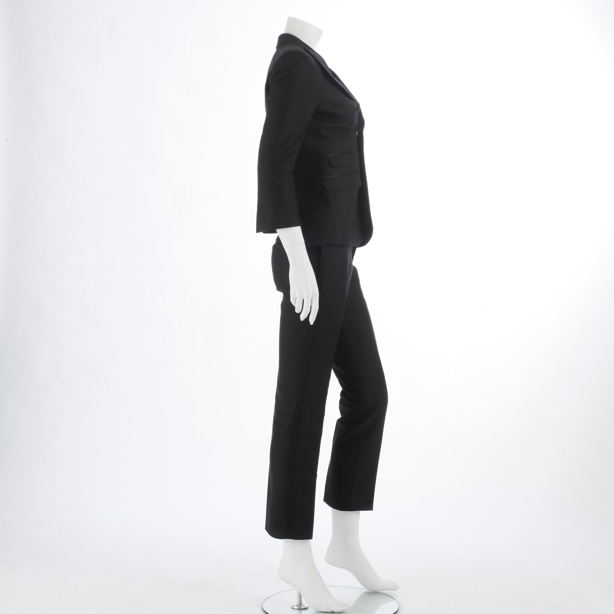 DSQUARED, a black cotton and silk two-piece suit consisting of jacket and pants. Size 42.