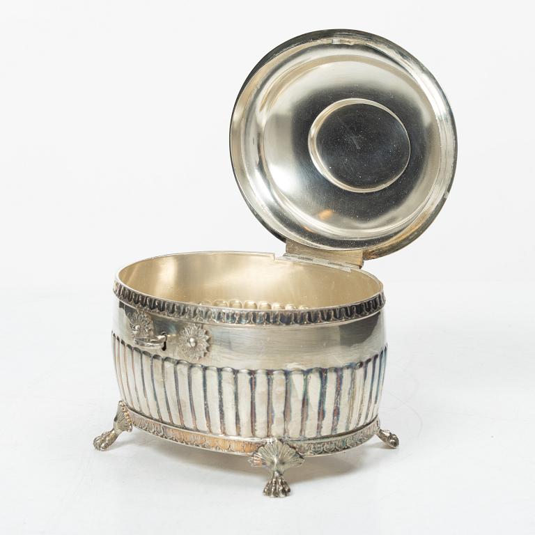 A Swedish silver coffee pot, cream jug and sugar box, Gustavian style, mark of AG Dufva, Stockholm 1911-1912.