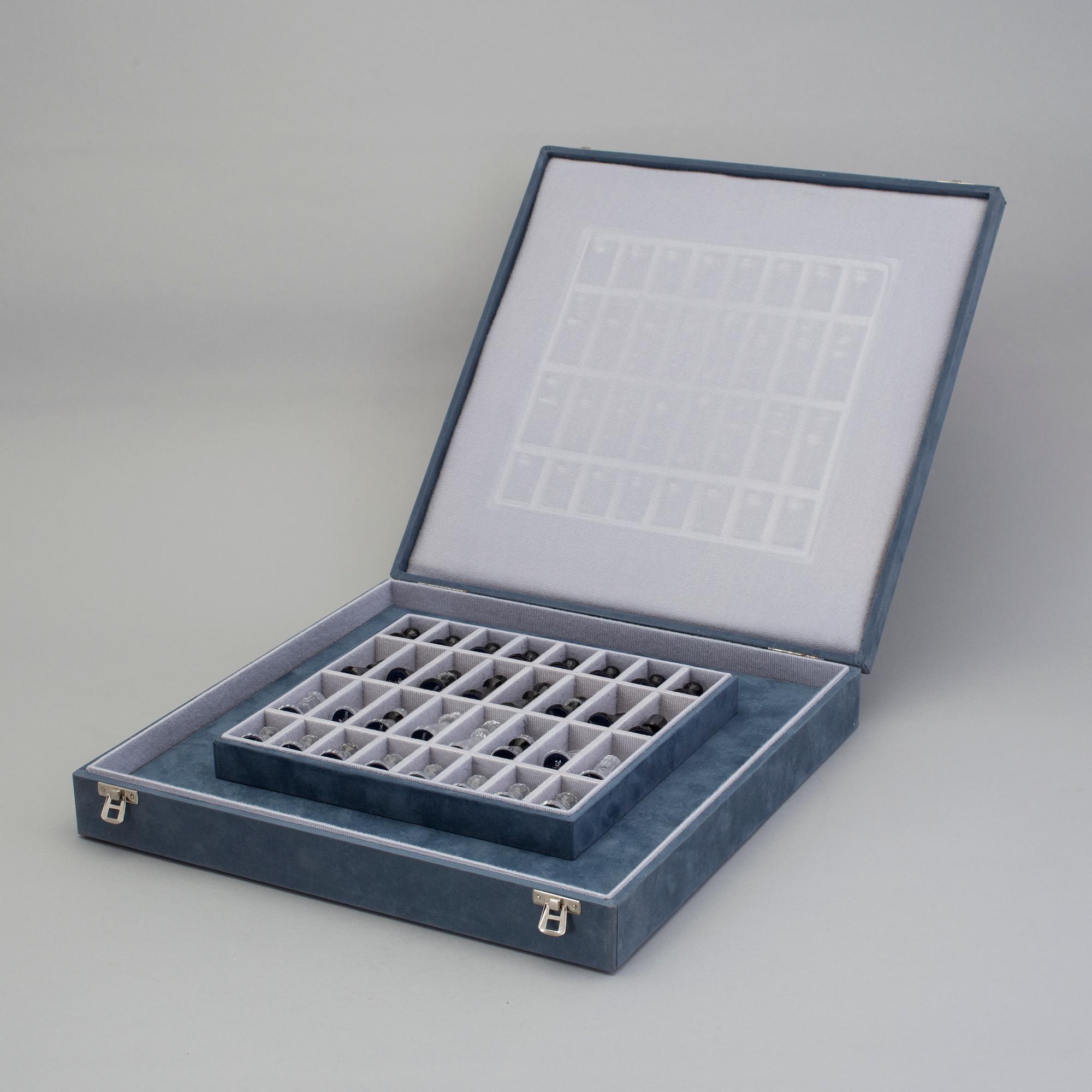 A SWAROVSKI CHESS SET.
