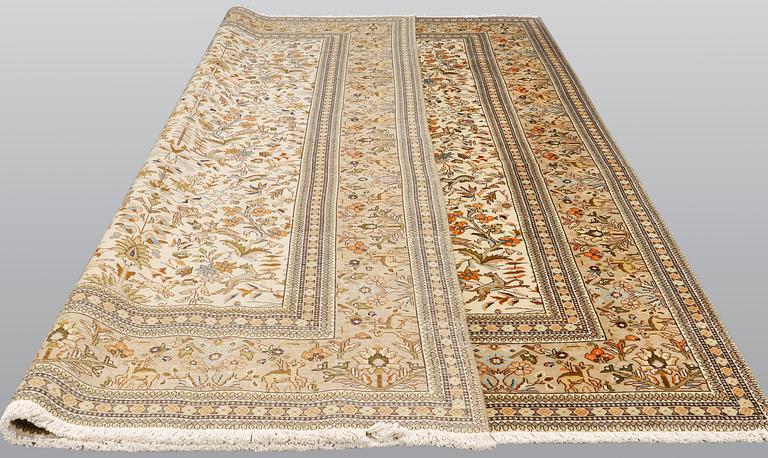 A Tabriz carpet, so-called Tabatabai, approx. 380 x 300 cm.