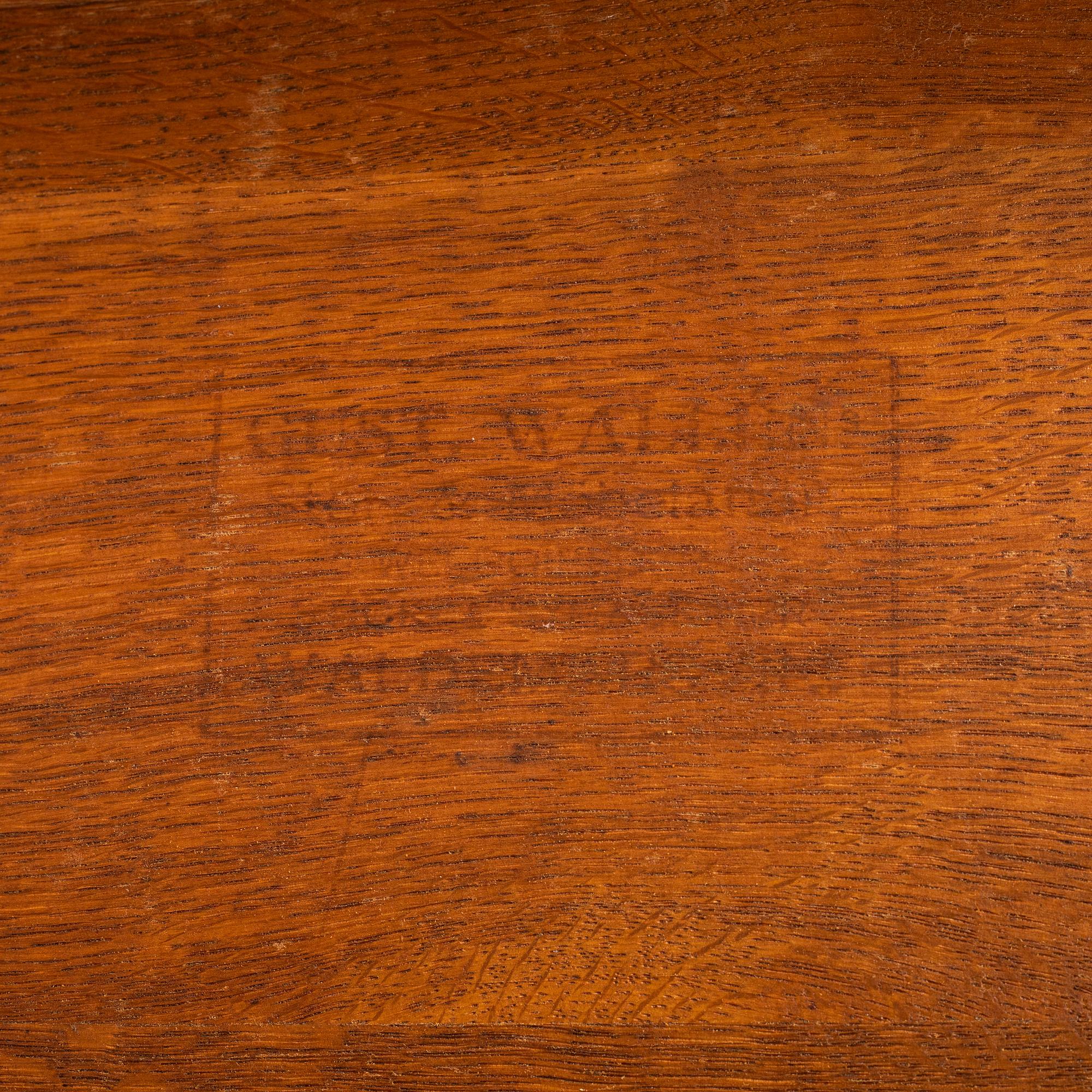 A carved oak sofa, circa 1900.