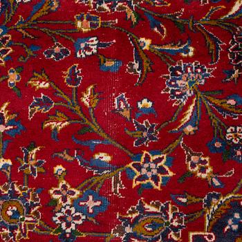 An Oriental carpet, c. 396 x 300 cm.