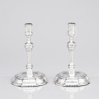 A pair of Swedish early 18th century silver candlesticks, mark of Petter Ersson Lund, Stockholm 1727.