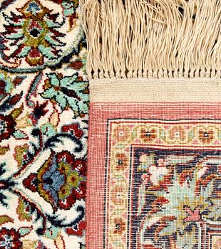 Hereke silk rug, approximately 125x70 cm.