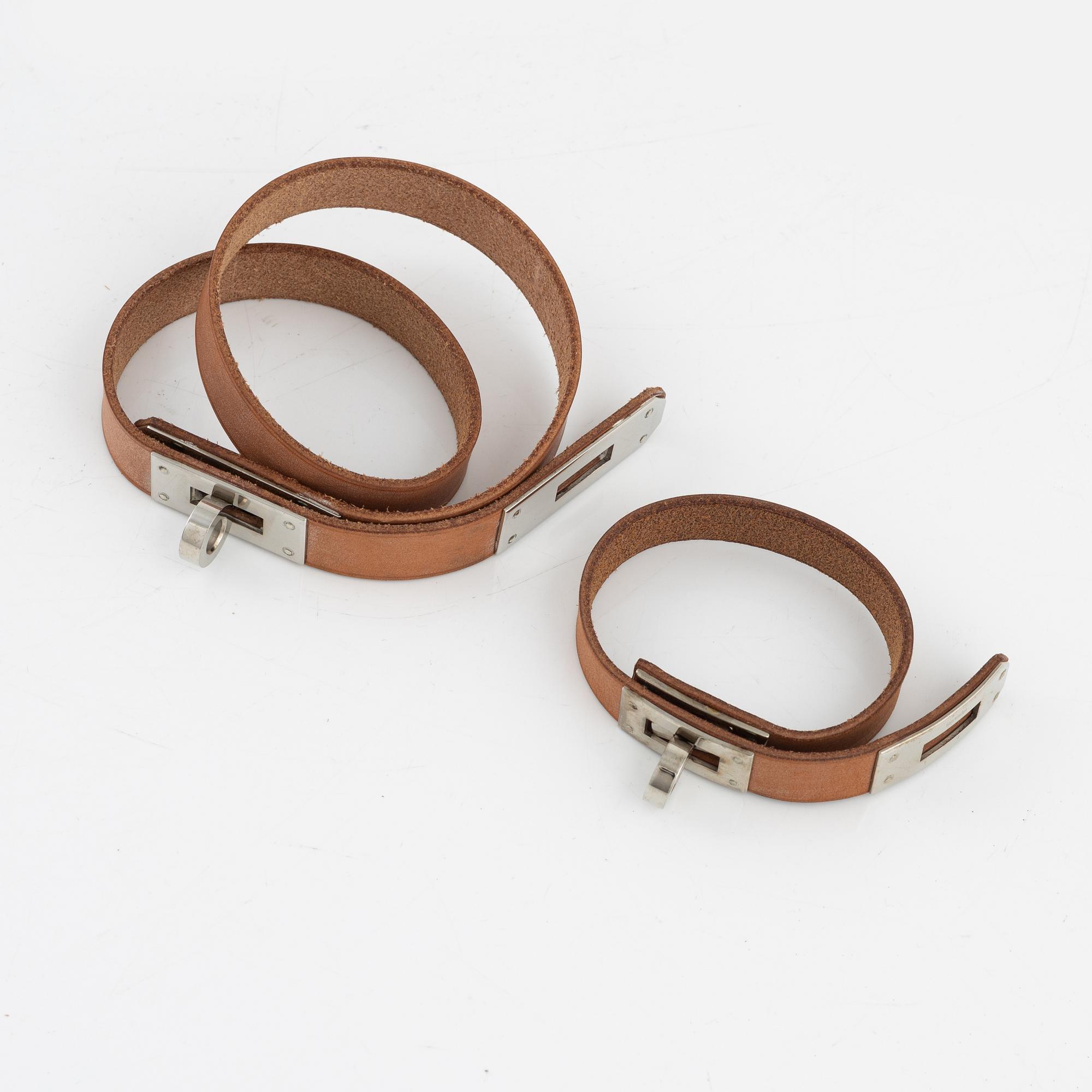 Hermès, two leather 'Kelly' bracelets.