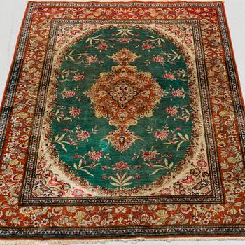 A RUG, silk Qum, probably, ca 145 x 100 cm.