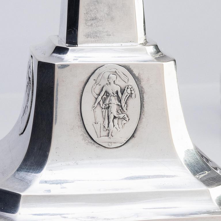 A pair of Swedish silver candelabras, marks of Pehr Zethelius, Stockholm 1797 and Daniel Hedberg, Eksjö 1829.