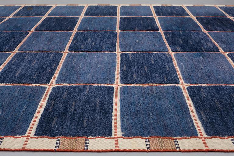 Märta Måås-Fjetterström, A CARPET, "Rutig blå halvflossa", knotted pile in relief, ca 304 x 209,5 cm, signed AB MMF.
