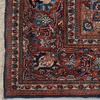 A CARPET. A semi-antique Kashan part silk. 248,5 x 136 cm.