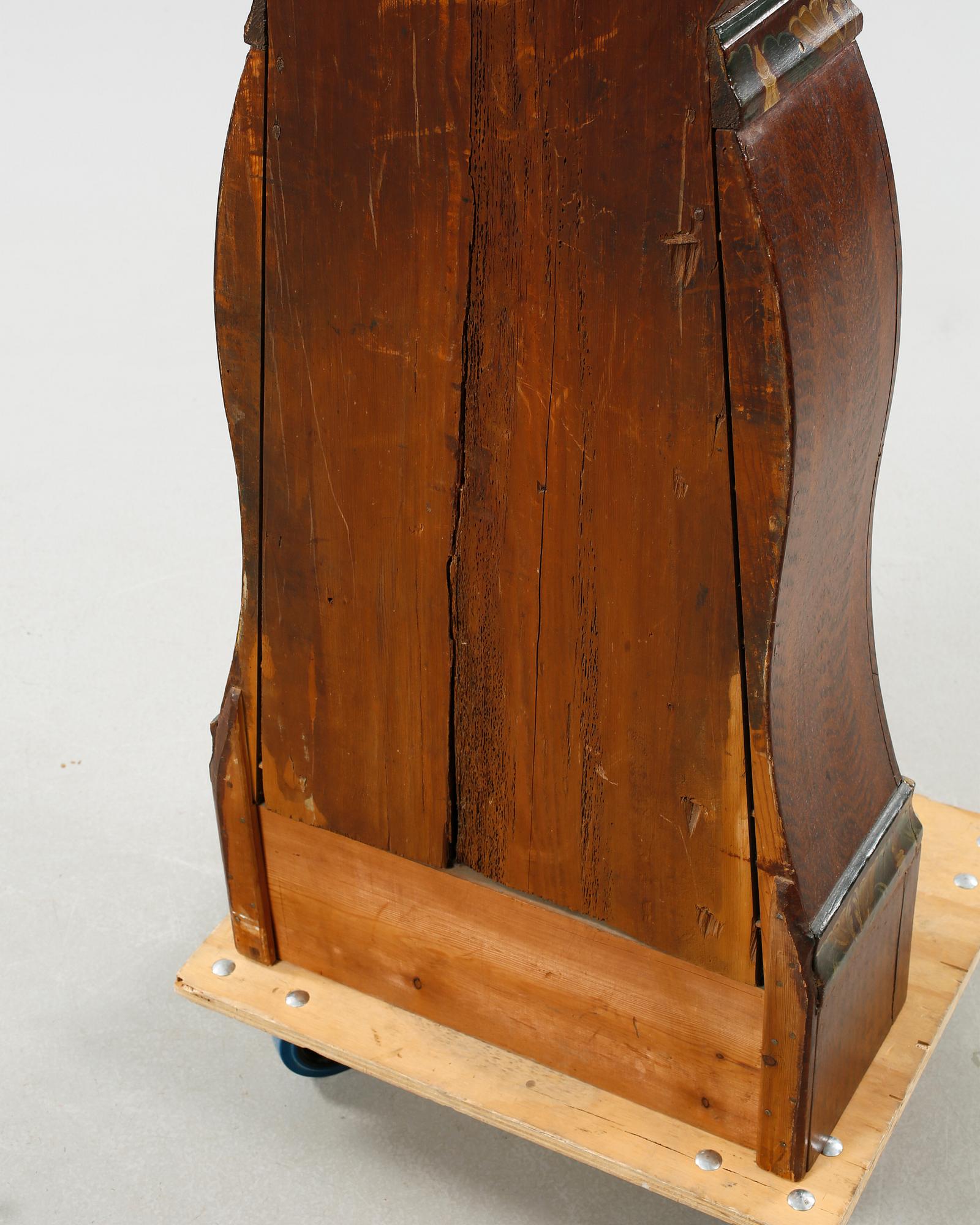A grandfather clock dated 1823.