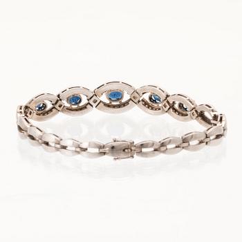 Armband 18K vitguld med ovalt fasetterade safirer samt briljantslipade diamanter, Stockholm.