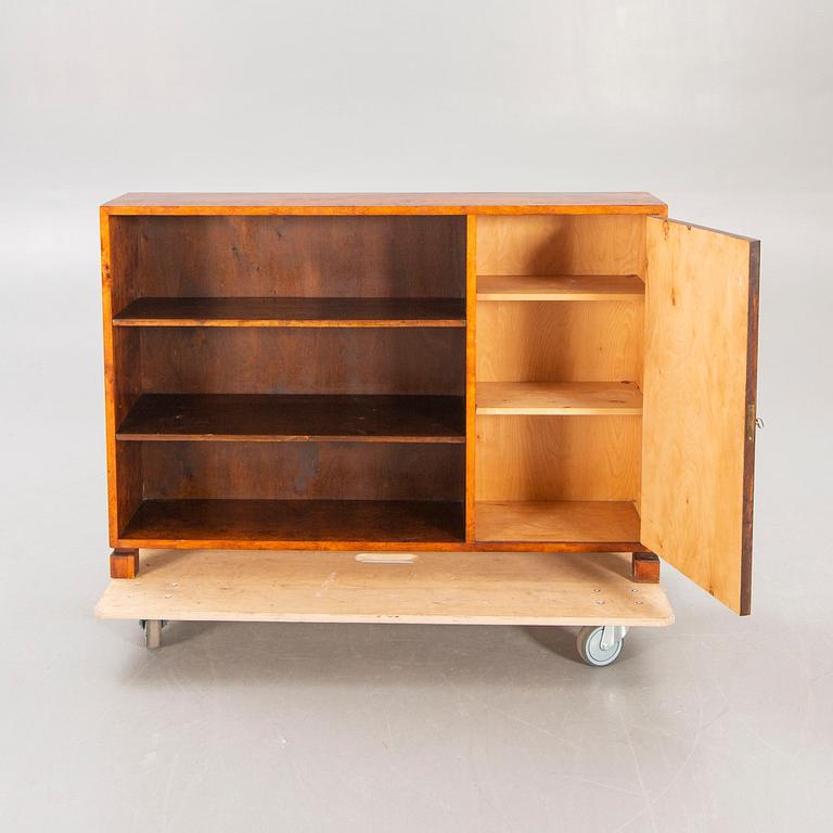 A 1930s birch bookcase.