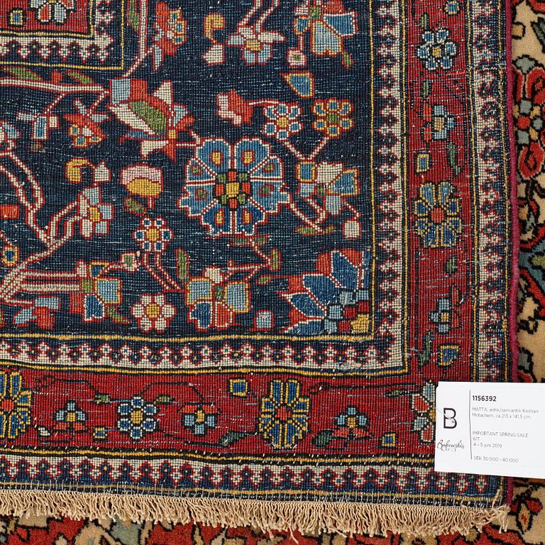 A RUG, an antique/semi-antique Kashan Motachem, ca 213 x 141,5 cm.