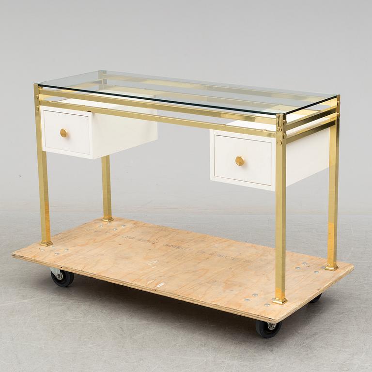 A 1980's dressing table with glasstop.