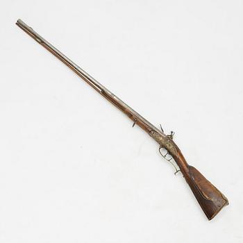 A flintlock gun, 18th century.