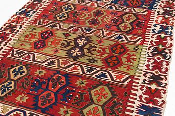 An antique southeast Anatolian kilim, c. 412 x 163 cm.