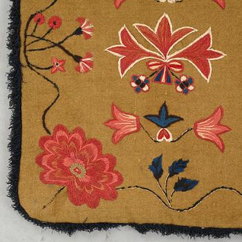 A carriage cushion, embroidered, ca 51-52 x 104,5-107 cm, signed and dated COS BMD ANO 1833, Scania.