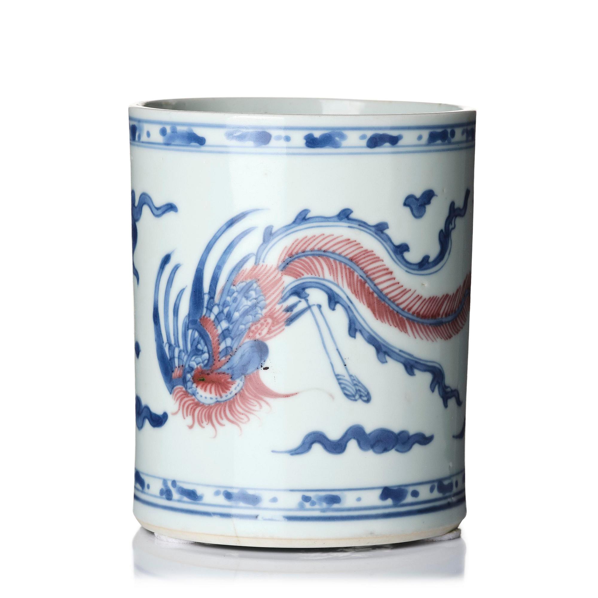 A blue and white and underglaze red 'phoenix' brushpot, Bitong, Qing dynasty, Kangxi (1662-1722).