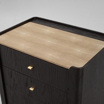 A black stained oak veneered 'Milano' dresser with top covering of faux stingray skin.