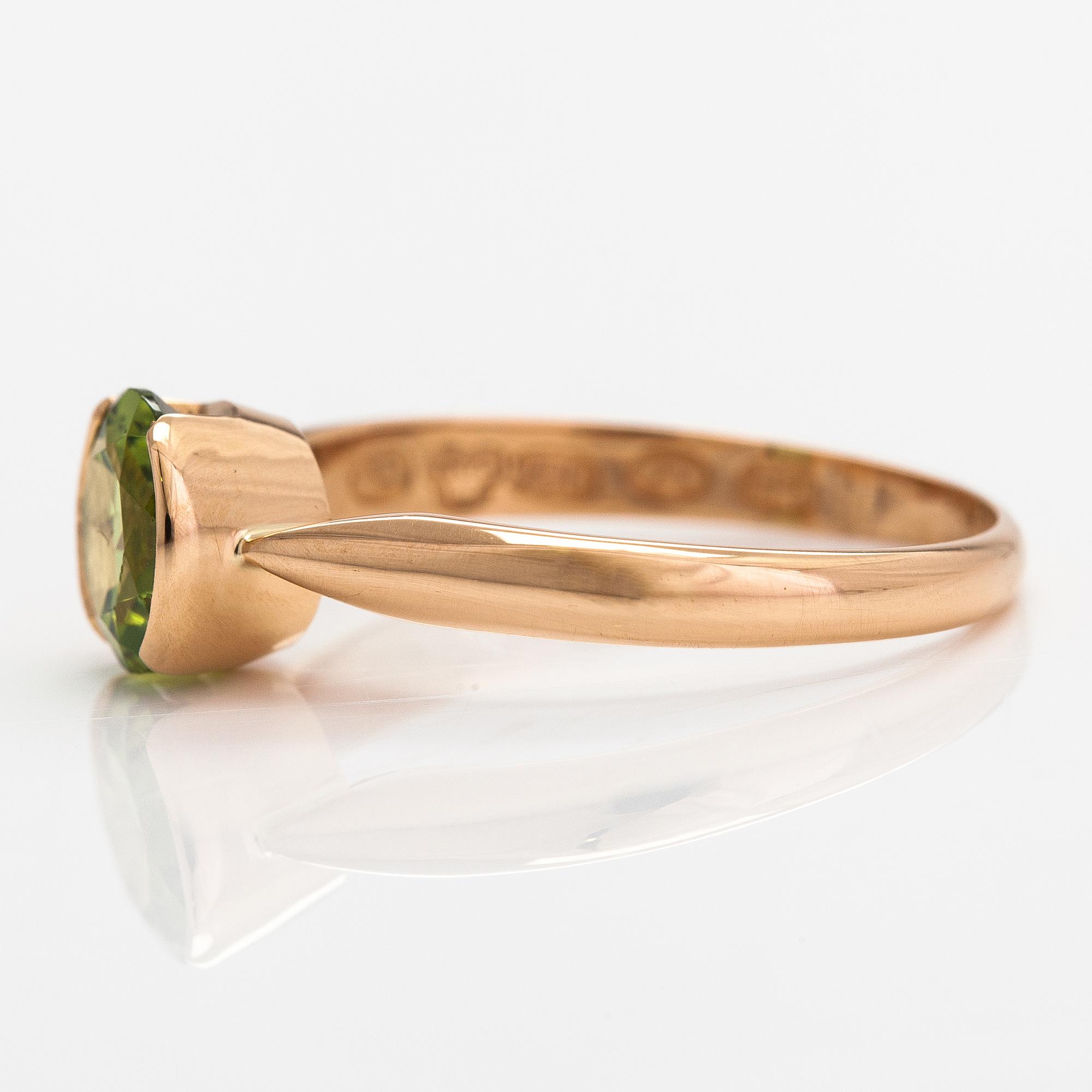 Ring, 18K guld och peridot. Kultateollisuus, Åbo 1917.