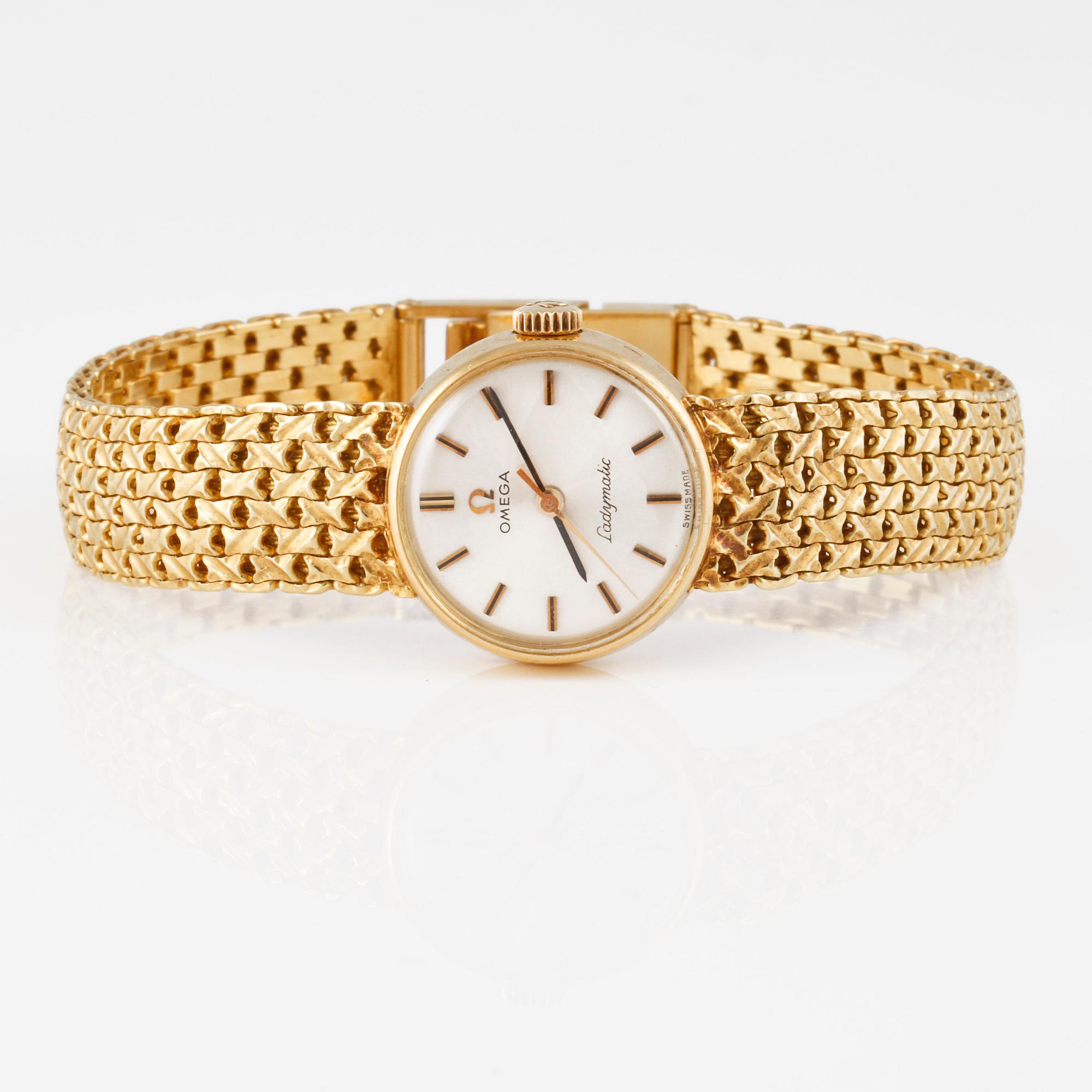 ARMBANDSUR, dam, guld, "Ladymatic" Omega. Total vikt 39 g.