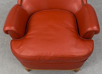 A 1930's leather upholstered 'Paris' lounge chair by Carl Axel Acking.