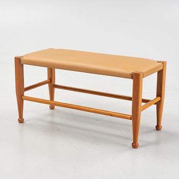 A model 2009 bench by Josef Frank for Firma Svenskt Tenn,