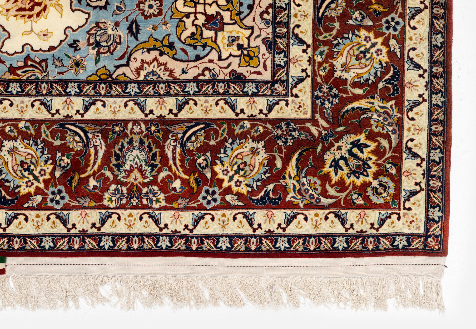 An Isfahan carpet, Central Persia, signed Akbaroff, c. 315 x 205 cm.