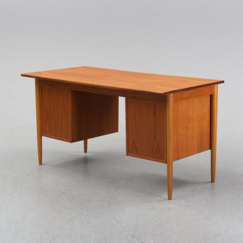 A 1950/60's oak and teak writing desk.