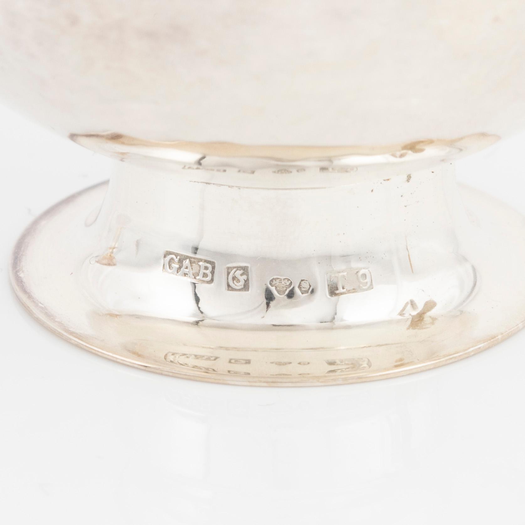 Twelve Swedish silver punsch mugs, including Gufa Gundefeldt & Falk, Gothenburg 1959.
