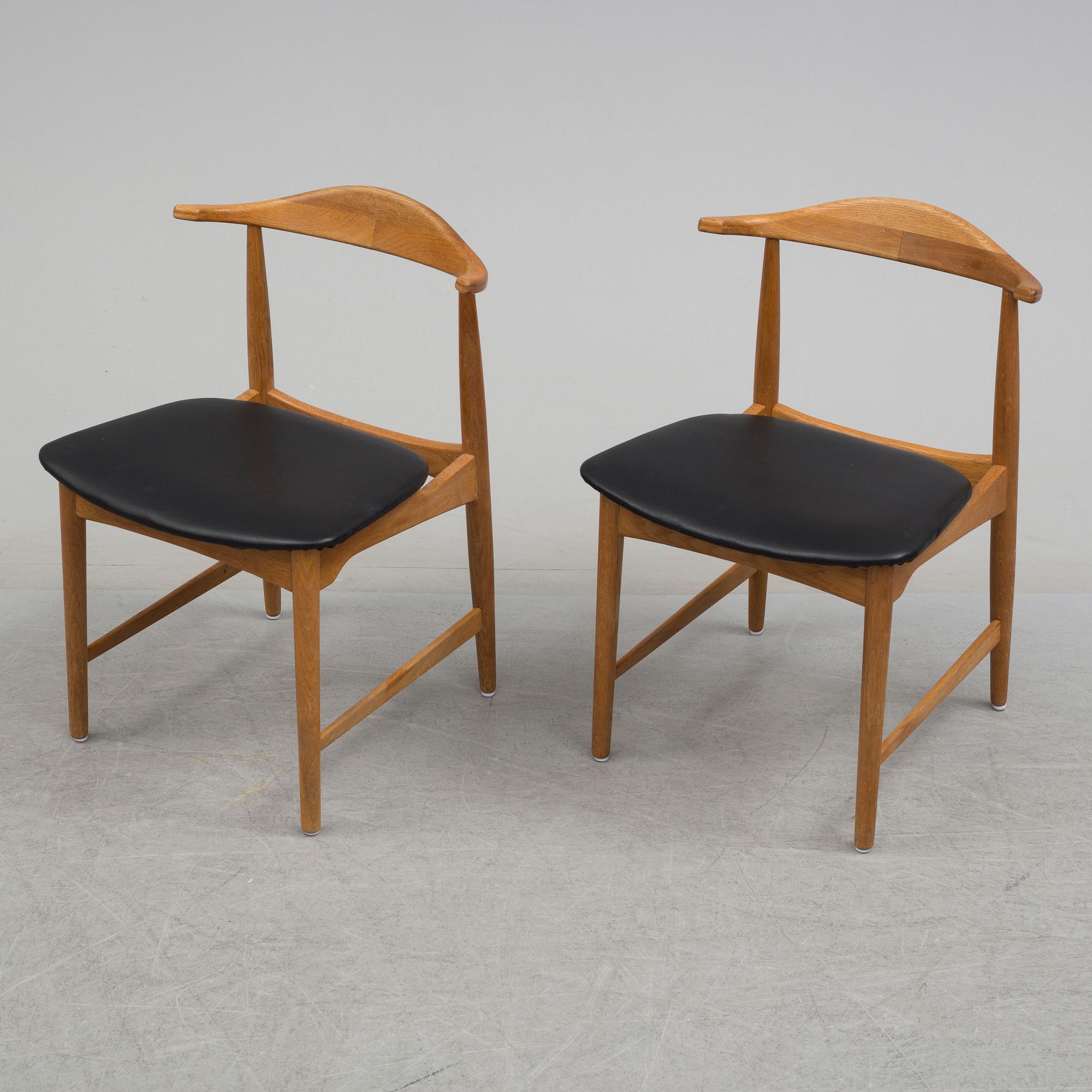 A pair of 1960's 'Danske' oak armchairs by Erik Wörtz IKEA.