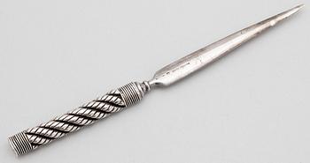 A letter opener by Hermès.