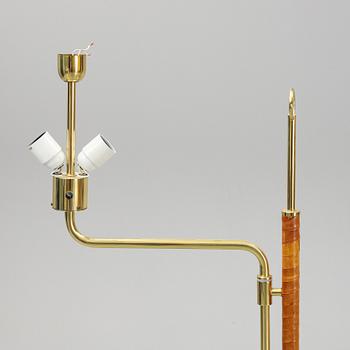 A pair of brass and leather floor lights, Örsjö industri, 21st century.