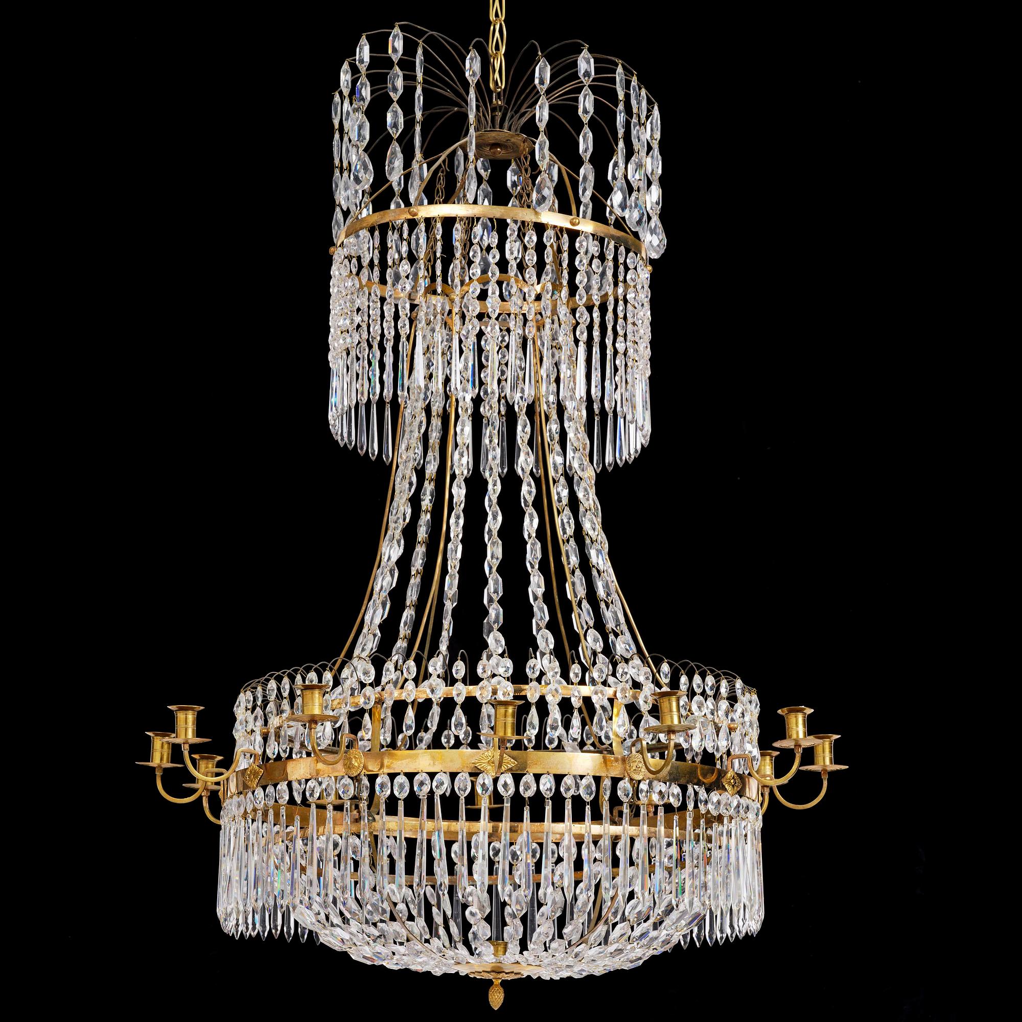 A late Gustavian thirteen-light gilt brass and cut glass chandelier, Stockholm, late 18th century.