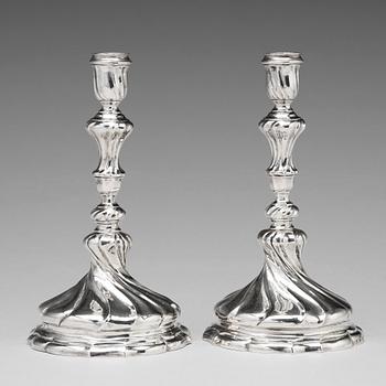 137. A pair of Swedish 18th century silver candlesticks, mark of Isak Sauer, Stockholm 1755.