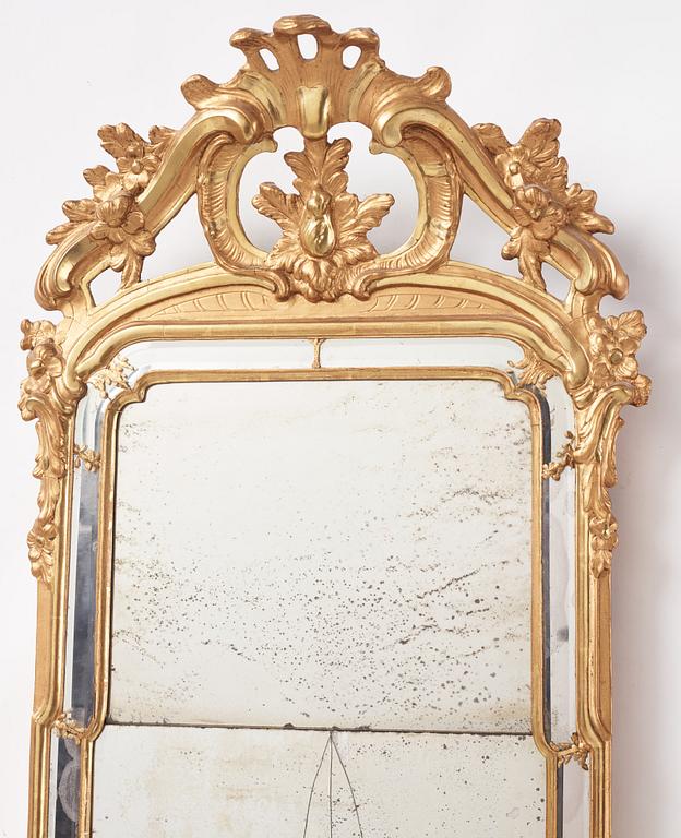 A Rococo giltwood mirror by N. Meunier (master in Stockholm 1754-97).