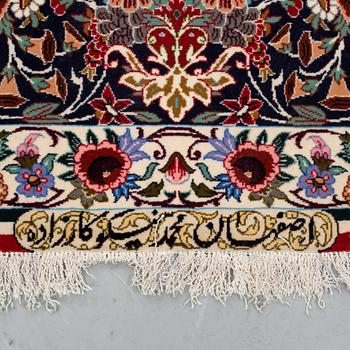 A CARPET, Esfahan, Signed Esfahan Miko Karzaadeh, around 239 x 157 cm.