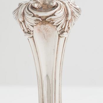 A pair of sterling silver candlesticks, maker's mark of Waterhouse, Hodson & Co, Sheffield 1832.