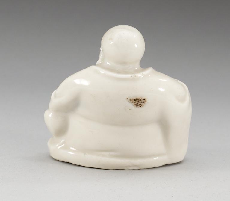 A porcelain figure of Buddhai, Qing dynasty.