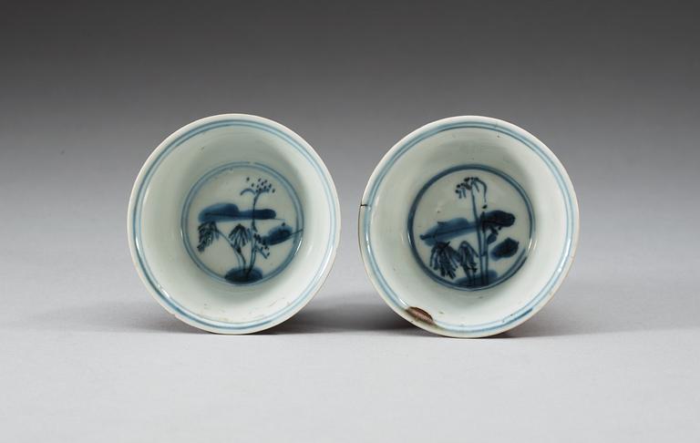 A set of two blue and white and cappuciner brown cups, Qing dynasty, first half of the 18th Century.