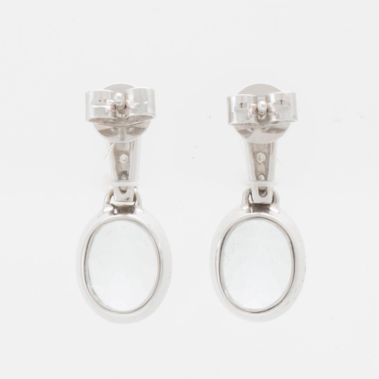 Örhängen 18K vitguld med ovalt fasetterade akvamariner samt runda briljantslipade diamanter.
