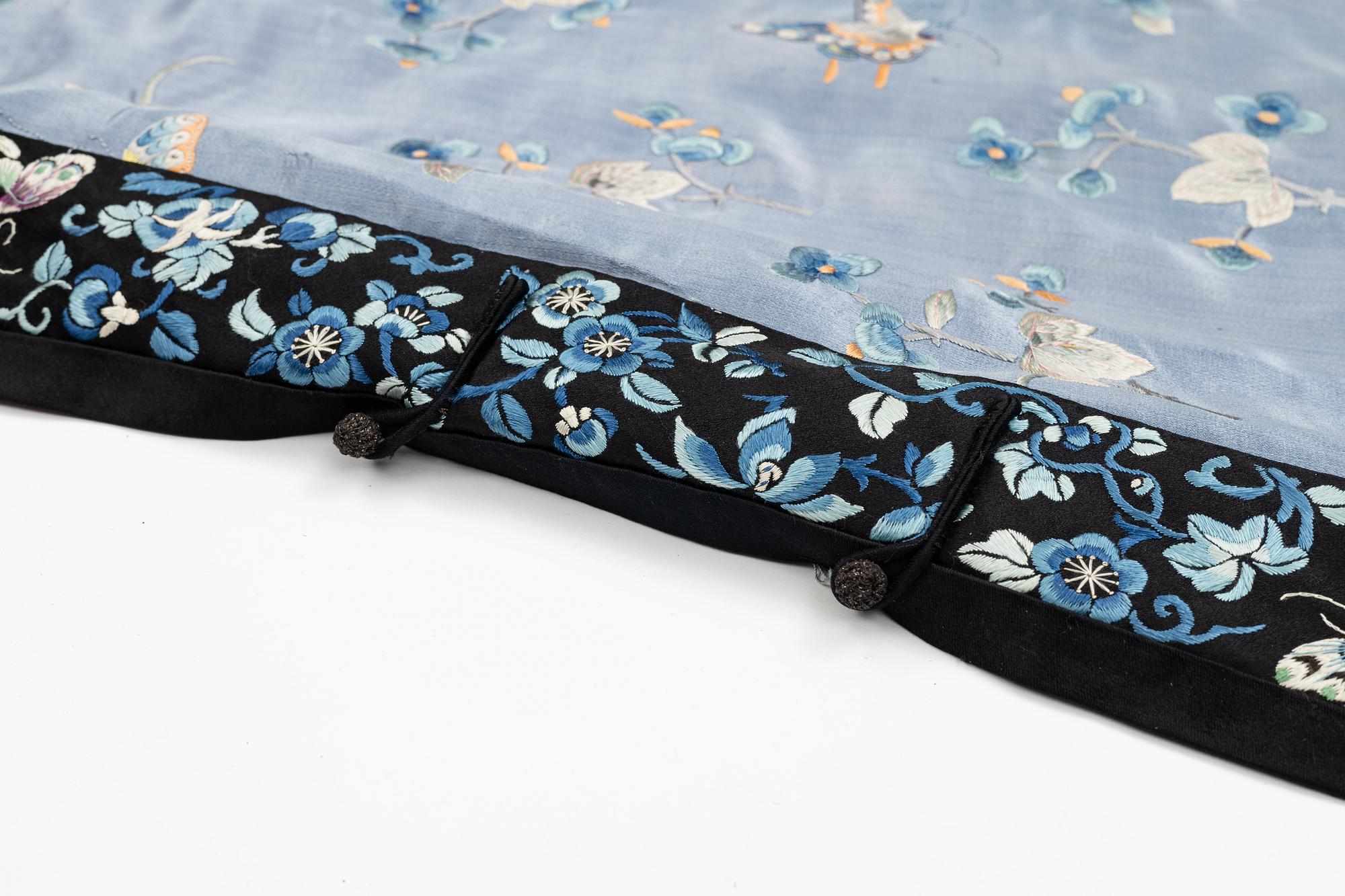 A lavender blue embroidered silk female informal robe, late Qing dynasty, 19th century.