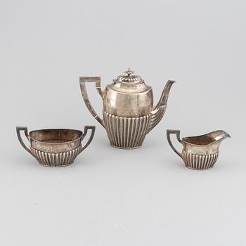 A silver coffee pot, creamer and sugar bowl, AG Dufva, Stockholm 1914.